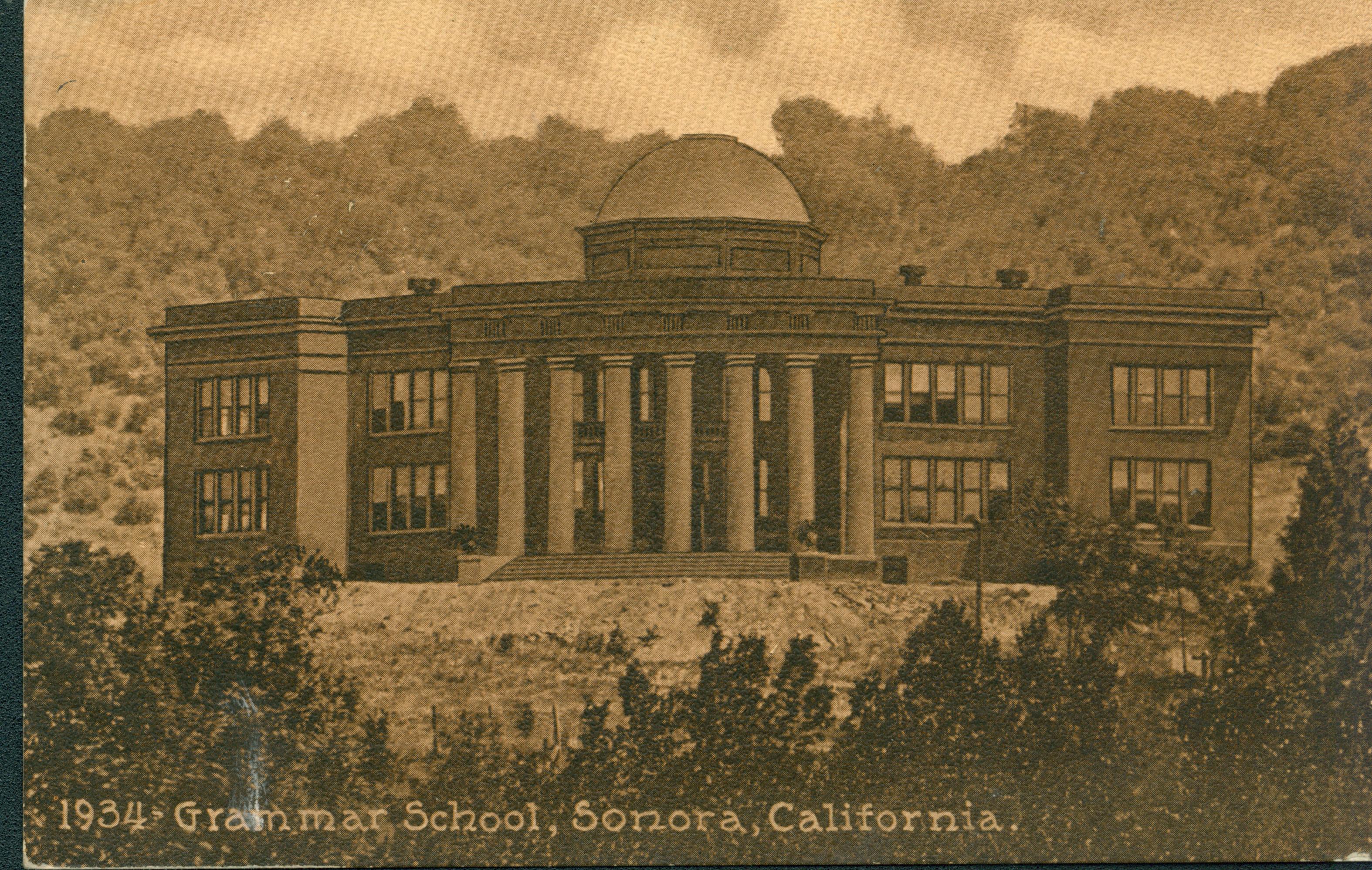 Shows the exterior of the elementary school in Sonora